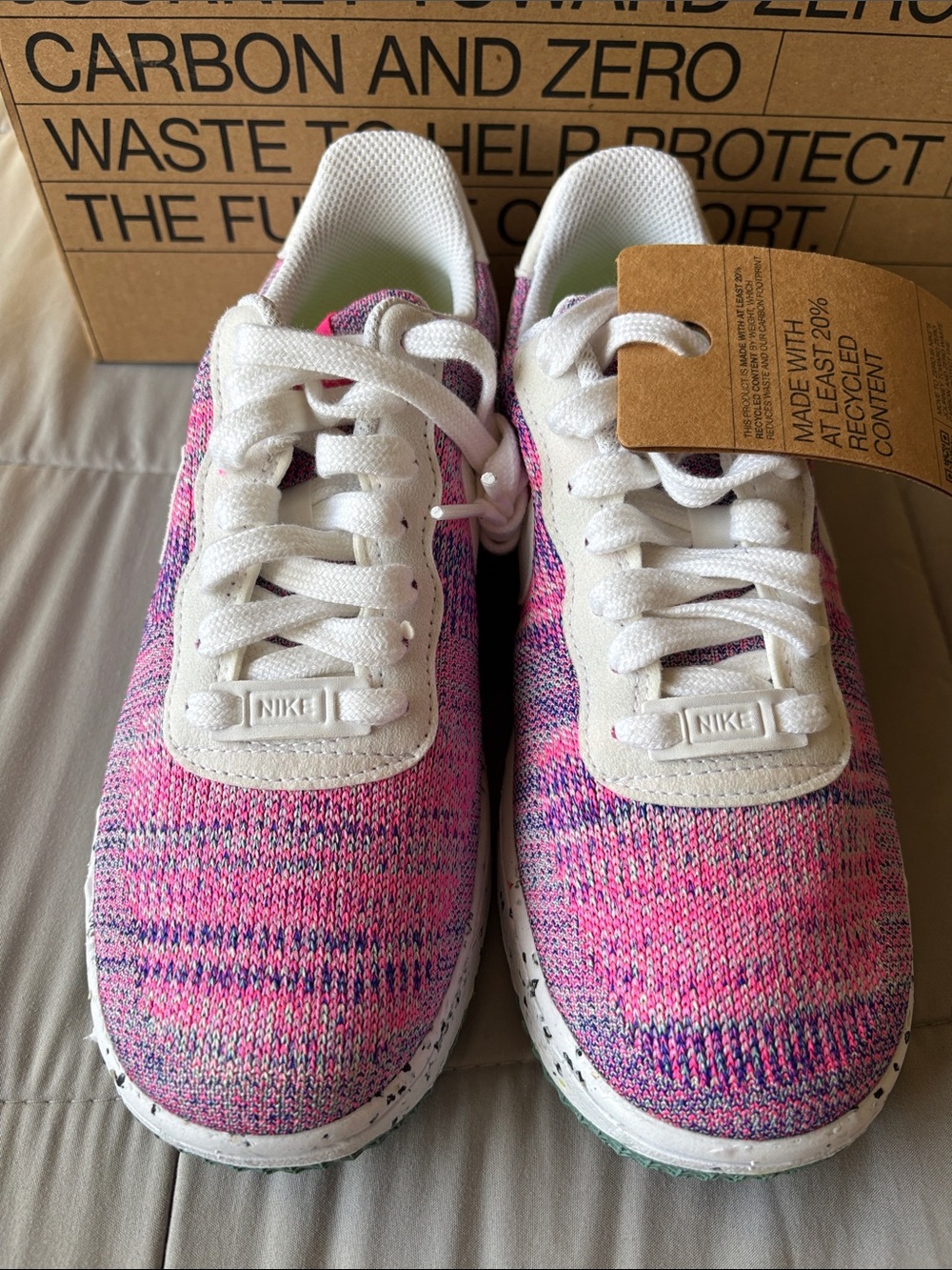 Nike Pink and Purple Flyknit Sneaker with White Swoosh